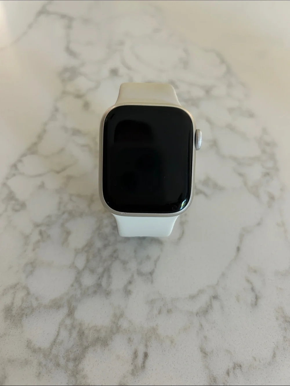 Apple Watch with White Silicone Band and Silver Case